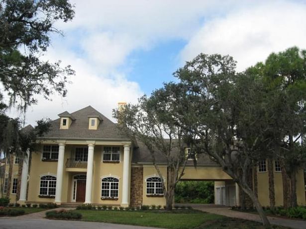 Private Residence with Porte Cochere and Guest Quarters. 6,000 SF in Bonita Springs, FL.