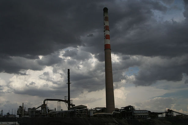 An abandoned smelting plant across the river diversion from Border Marker #1. The difference in strict environmental rules between the two countries encouraged the closing of plants like this one. Environmentally disastrous businesses moved and reopened in Mexico.