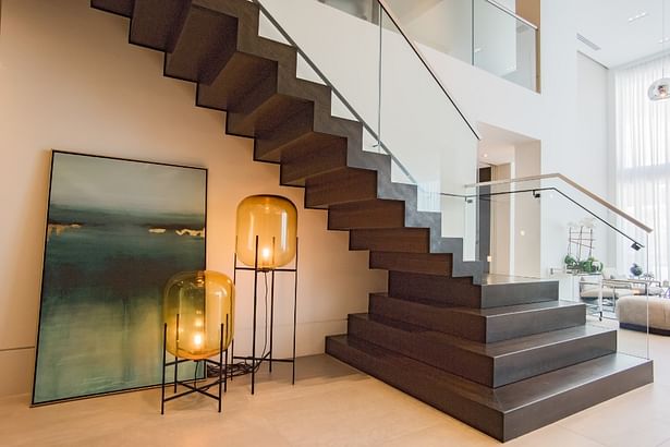 The exposed zigzag design gives the illusion of a floating staircase.
