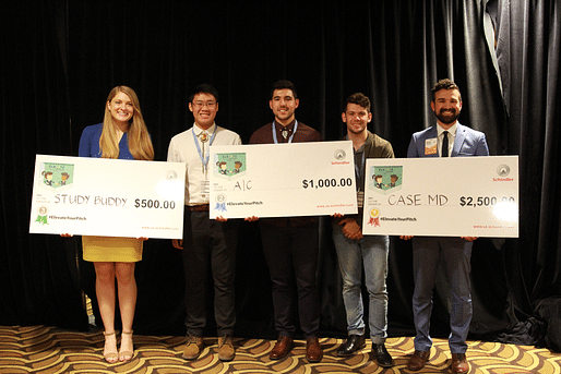 The Elevate Your Pitch finalist winners with their cash prizes. Photo courtesy of the AIAS.