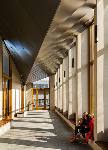 waiting room—suggests the Gothic, with its cathedral-like interior