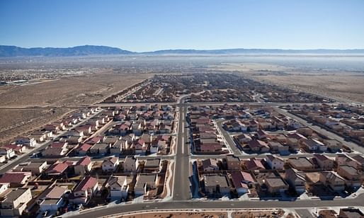 One of the existing suburban developments in the desert outside Albuquerque; beyond the city limits, land is cheaper and taxes are lower. Photograph: Trekshots/Alamy, image via theguardian.com.