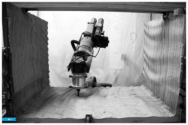 Fig 4: stacked plywood being milled by six-axis robotic arm