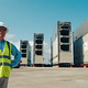 An engineer stands in front of the massive lock gates being used in the Panama Canal expansion. Credit: Radiant Features / the History Channel