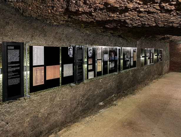 Death road: It leads from the first lists in 1946 to the registration of the concentration camp corpses incinerated in Steyr crematorium and 'Opening of the Urn Graves' in 2011 to the two historical 'Death Marches of Hungarian Jews' in April 1945. The road ends in an empty space. 