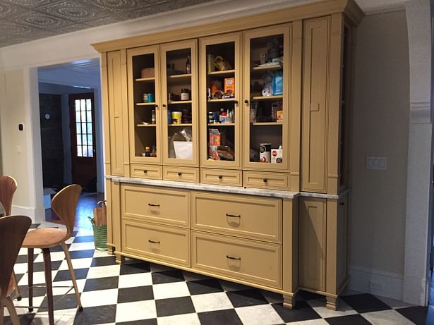 RHINECLIFF KITCHEN PANTRY - The Pantry is pronounced with an alternate color to treat it as a piece of furniture instead of cabinetry....minus the obscure Glass yet to arrive