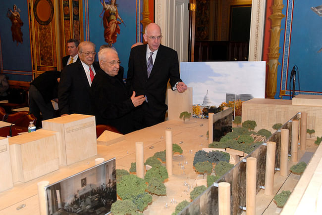 Frank Gehry and members of the Memorial Commission view model of Gehry's Eisenhower proposal. Image via carnageandculture.blogspot.com.