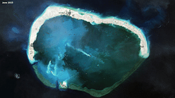 New satellite images show progress in China's island-building project