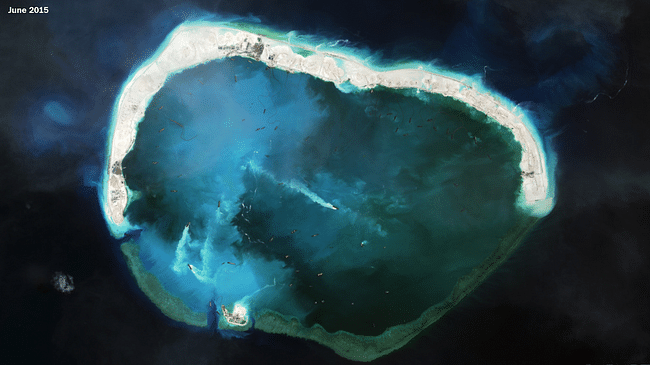 Several landmasses have been connected forming Mischief Reef, with a wide opening suggesting a possible future use as a naval base. Credit: CSIS Asia Maritime Transparency Initiative/DigitalGlobe via Washington Post