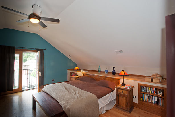 The Master Bedroom with high ceilings.