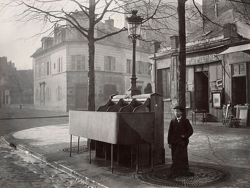 This photograph from 1865 shows a public pissoir in Paris. These are the forerunners of other public restrooms, but their use was exclusively for men urinating. Credit: Wikipedia