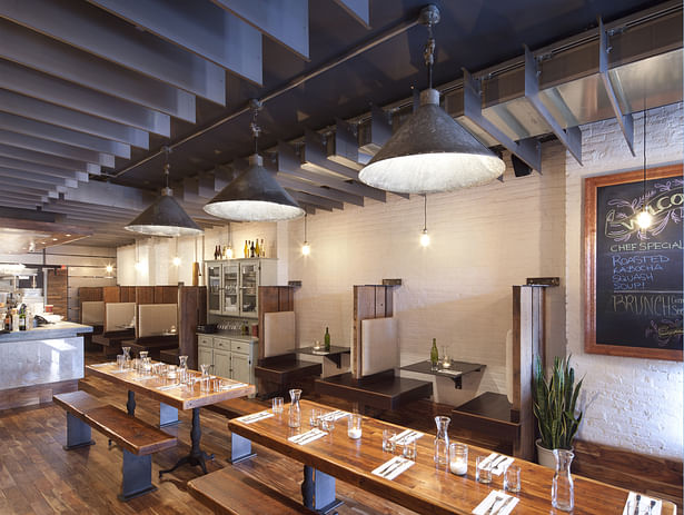 MOOBURGER - Dining room with steel ceiling fins & antique pendant lights