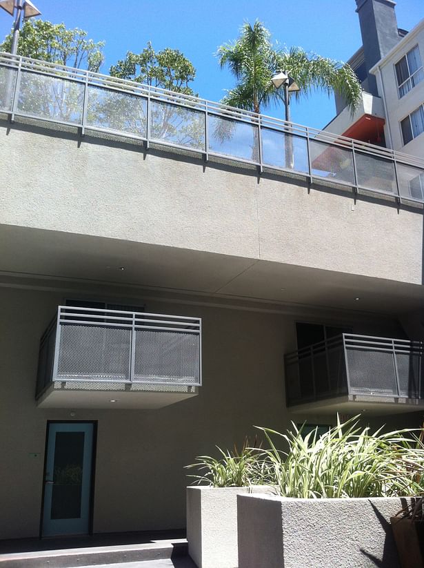 Private 2-level Balconies along new Courtyards.