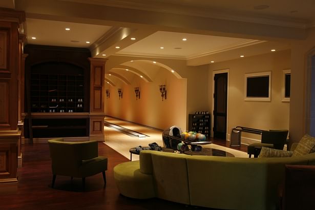 This two-lane bowling alley adds an informal entertaining area for friends and family to this custom residence.