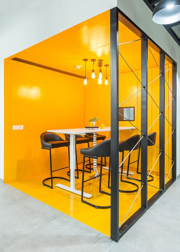 To break the monotony of traditional corporate spaces, the team meeting room features a pop of quirk.