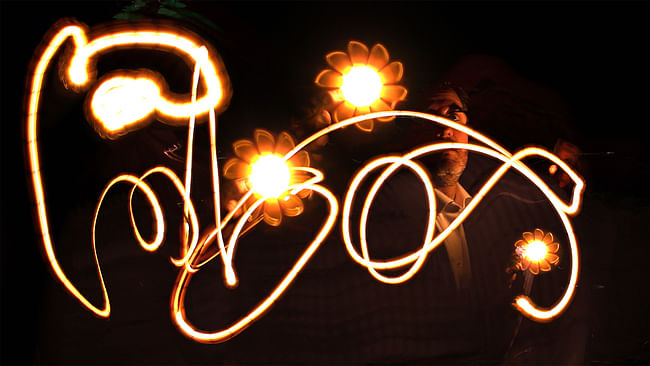 Olafur Eliasson creating light graffiti. Image courtesy of MIT Council for the Arts.