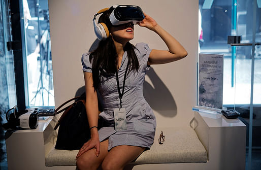 A woman wears Samsung's virtual-reality headset. Image from Bloomberg News, via wsj.com.