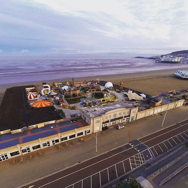 Aerial view of 'Dismaland,' the rumored Banksy pop-up show in the British seaside resort of Weston-Super-Mare. Photo: Iain Brimecome & Jon Goff, image via streetartnews.net.