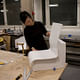 7. Jennifer Wong holding final uncut foam shell of Kari 3 chair