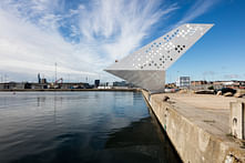 Perforated "Sailing Tower" spotlights Denmark's commercial Aarhus harbor