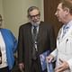 Sheri Marker-Bednarz, Dr. Ross Abrams, Chair of the Radiation Oncology Department, and Tom Deutsch, Provost, Rush University.