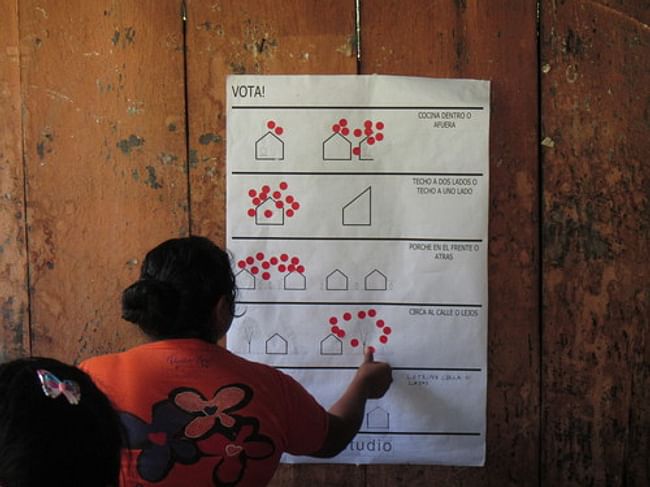 Woman voting on building location