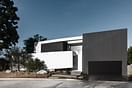ELL House by Domaen maximizes 'remodeled' footprint with strategic hillside ordinance loophole