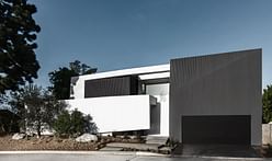 ELL House by Domaen maximizes 'remodeled' footprint with strategic hillside ordinance loophole