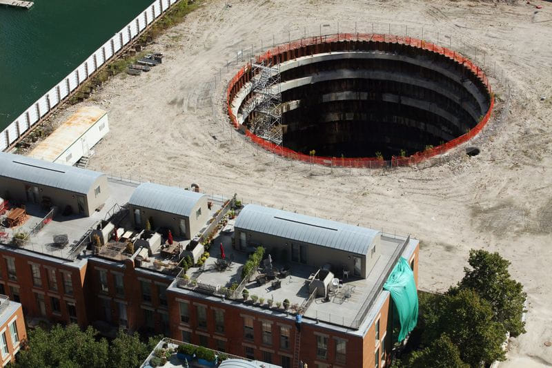 Curated visual reference: Filling The Chicago Spire Hole Reference: Chicago Spire S Gaping Hole To Be Hidden Behind Piles