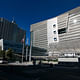 The San Francisco Federal Building (2006), a slender, 18-story tower with a dual facade of glass and a folded and perforated metal skin that is graceful, yet powerful. The building is the first office tower in the U.S. to forgo air-conditioning in favor of natural ventilation. (Image: Wikipedia)