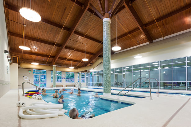 The Aquatic Center greets residents upon entry to the Fitness Center. The vaulted ceiling adds to the spa feeling of this space.