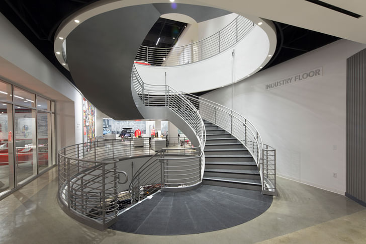 The interior stairway joining the three levels of the museum (image via The Petersen Museum)