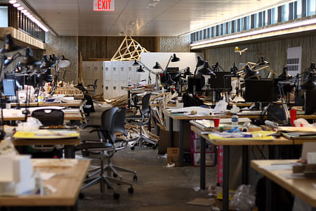 Yale student desks, or a studio in the midst of a deadline? It's the former, but according to Sarah Lorenzen the boundary between academia and practice is more permeable than you might think. Image: Wikipedia 
