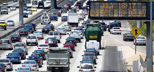 A sign warns motorists of a two-day closure of Interstate 405 on July 16 and 17 because of construction. (Jonathan Alcorn / Bloomberg / July 12, 2011)