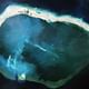 Several landmasses have been connected forming Mischief Reef, with a wide opening suggesting a possible future use as a naval base. Credit: CSIS Asia Maritime Transparency Initiative/DigitalGlobe via Washington Post