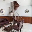 A spiral staircase is a perfect solution for any compact space.