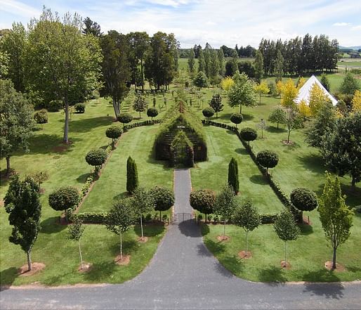 The quaint little Tree Church blends effortlessly into its garden surroundings. Photo: Barry Cox/Tree Church, via Slate