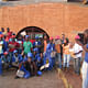 Workers at the Manica Football for Hope Center receiving their training certificates. Location: Manica, Mozambique. Credit: Paulo Carneiro