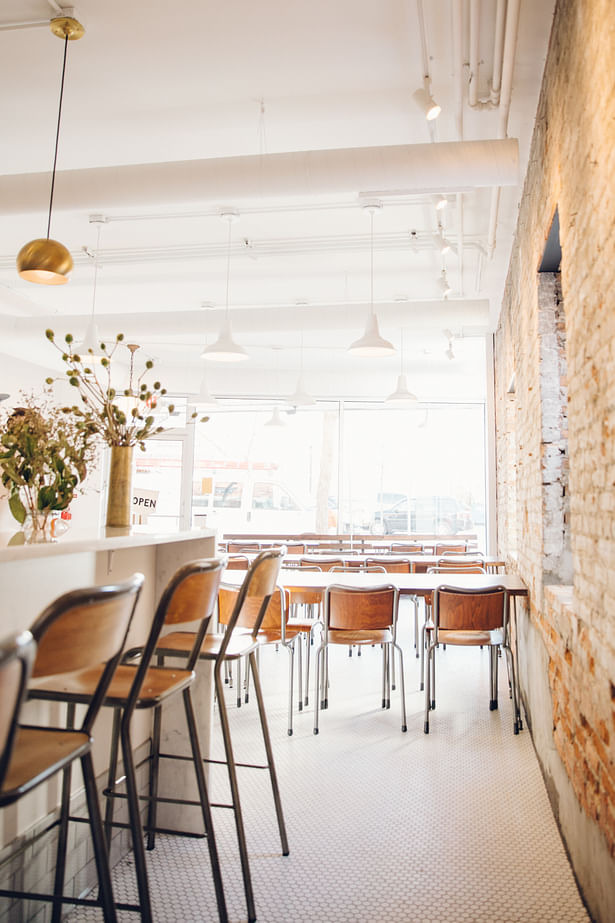 Spencer bar seating and dining area. Synecdoche Design (photo by Cat Buswell)