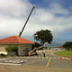 Andy Goldsworthy's tree sliding into the Presidio's Powder Magazine building. Photo: http://presidio-brat.blogspot.com