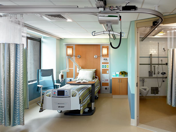 Rehabilitation Acute Care Patient Room with overhead Liko lifting system.