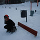 Jennifer Wong in relationship hidden park bench buried in snow.