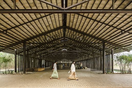 Drop-off area beneath the porch, looms in the background, Amber Denim Loom Shed, Gazipur, Bangladesh. © Aga Khan Trust for Culture / Sandro di Carlo Darsa (photographer)