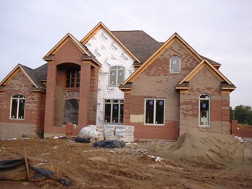 A McMansion under construction. Image via wikimedia.org