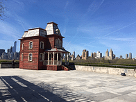 A full-scale replica of the "Psycho" house touches down on the roof of the Met