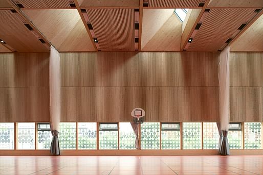 MERIT: Multi-functional Sports Hall Alice Milliat, Lyon, France, Dietrich | Untertrifaller Architekten and Tekhnê Architectes. Courtesy of the 2017 Wood Design & Building Awards.