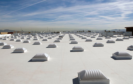 A white roof, or "cool roof" in Las Vegas. New studies prove that such roofs can drastically reduce temperatures during a heat wave. Credit: Wikipedia.