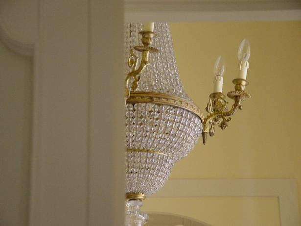 French Impero lamps trought the door at third level