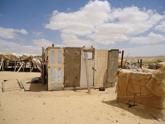 Cities and Community: Dr Irit Katz, University of Cambridge, UK | Project: “The Common Camp: Temporary Settlements as a Spatio-political Instrument in Israel-Palestine”. Above: A makeshift structure made of reused doors (2013). Photographer: Irit Katz.