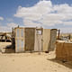 Cities and Community: Dr Irit Katz, University of Cambridge, UK | Project: “The Common Camp: Temporary Settlements as a Spatio-political Instrument in Israel-Palestine”. Above: A makeshift structure made of reused doors (2013). Photographer: Irit Katz.